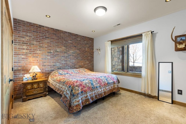 715 Bates Rd, Manhattan, MT 59741 - bedroom with brick wall, light colored carpet, baseboards, and recessed lighting