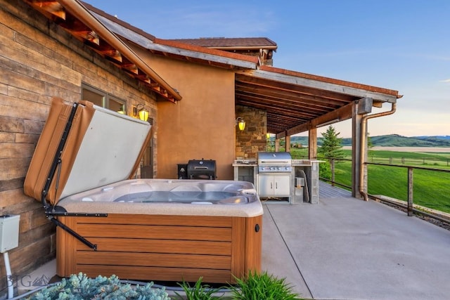 715 Bates Rd, Manhattan, MT 59741 - view of patio featuring a hot tub and a grill