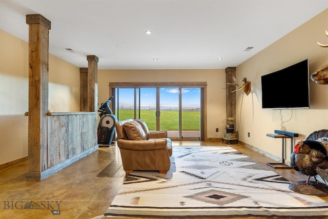 715 Bates Rd, Manhattan, MT 59741 - living area with ornate columns, baseboards, and recessed lighting