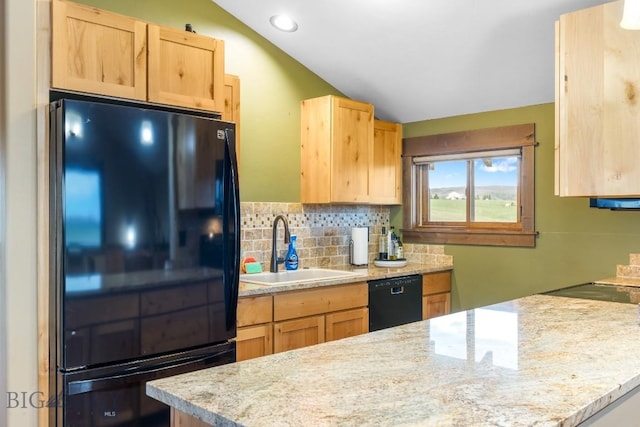 715 Bates Rd, Manhattan, MT 59741 - kitchen with black appliances, a sink, light brown cabinets, tasteful backsplash, and vaulted ceiling