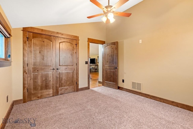 715 Bates Rd, Manhattan, MT 59741 - unfurnished bedroom featuring lofted ceiling, carpet, baseboards, and ceiling fan