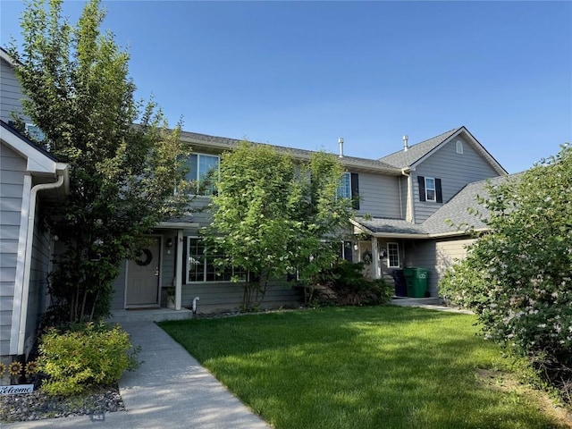 226 Peter Pl Unit A-D, Bozeman, MT 59718 - view of property hidden behind natural elements featuring a front yard
