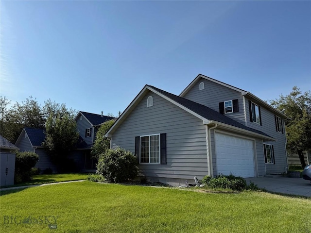 226 Peter Pl Unit A-D, Bozeman, MT 59718 - view of side of property featuring concrete driveway and a lawn