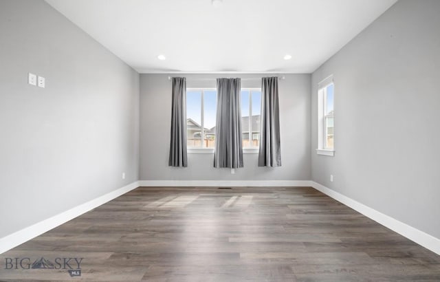 1518 Deadwood Loop, Belgrade, MT 59714 - spare room with baseboards, recessed lighting, and wood finished floors