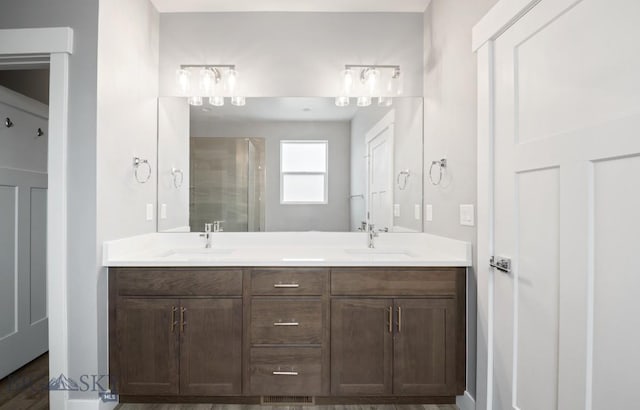 1518 Deadwood Loop, Belgrade, MT 59714 - full bath featuring double vanity and a shower with door