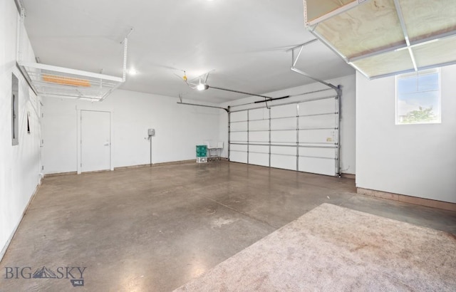 1518 Deadwood Loop, Belgrade, MT 59714 - garage featuring a garage door opener