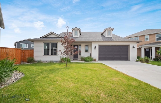 1518 Deadwood Loop, Belgrade, MT 59714 - view of front of home with an attached garage, driveway, and roof with shingles