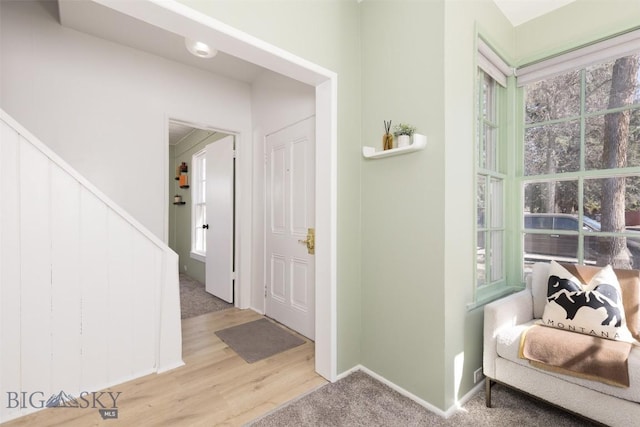209 S Tracy, Bozeman, MT 59715 - hallway featuring wood finished floors and carpet