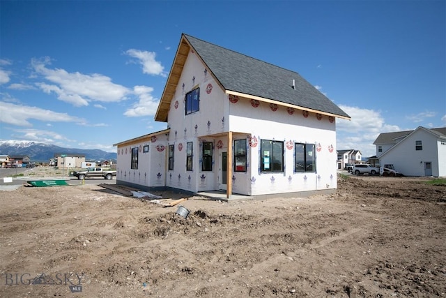 500 Spaniel Ln, Belgrade, MT 59714 - rear view of property featuring a shingled roof