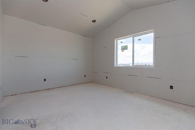 500 Spaniel Ln, Belgrade, MT 59714 - empty room featuring vaulted ceiling