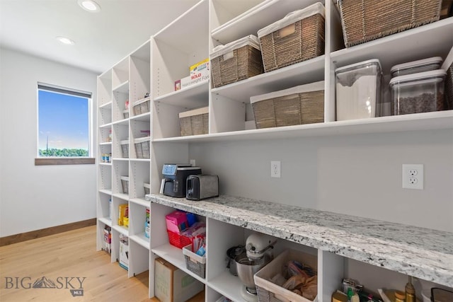 3483 Highline Rd, Manhattan, MT 59741 - detailed view of wood finished floors, baseboards, and recessed lighting