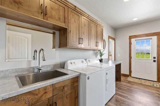 3483 Highline Rd, Manhattan, MT 59741 - laundry area with washer and dryer, cabinet space, wood finished floors, recessed lighting, and baseboards