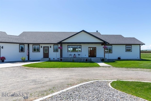 3483 Highline Rd, Manhattan, MT 59741 - view of front of home with a front yard, a shingled roof, and driveway
