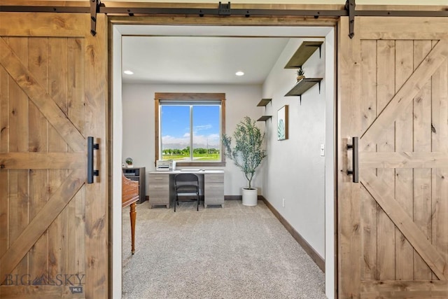 3483 Highline Rd, Manhattan, MT 59741 - home office with a barn door, carpet, baseboards, and recessed lighting