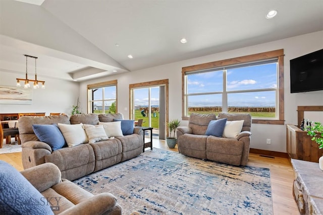 3483 Highline Rd, Manhattan, MT 59741 - living area with a chandelier, light wood-style floors, recessed lighting, baseboards, and vaulted ceiling