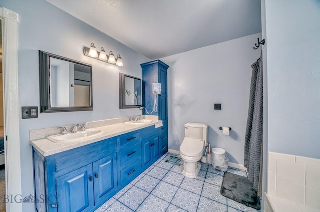 118 Clinton, Belgrade, MT 59714 - bathroom featuring double vanity and tile patterned floors