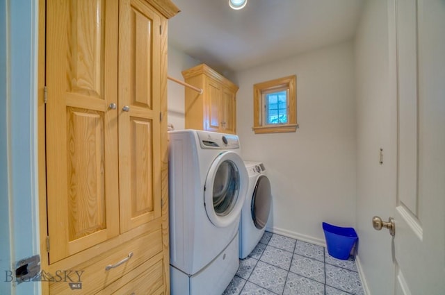 118 Clinton, Belgrade, MT 59714 - laundry room with washing machine and dryer, cabinet space, and light tile patterned floors