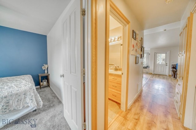 118 Clinton, Belgrade, MT 59714 - hall with baseboards and light wood-style floors
