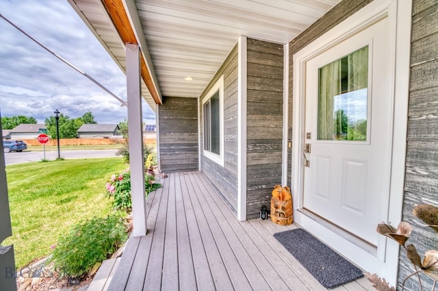 118 Clinton, Belgrade, MT 59714 - doorway to property with a porch and a lawn