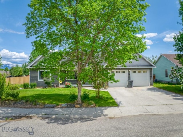 118 Clinton, Belgrade, MT 59714 - obstructed view of property with concrete driveway