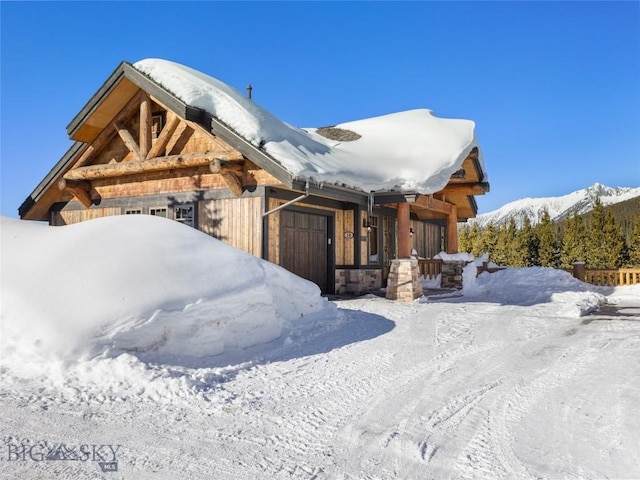 18 Upper Cascade Ridge Rd Unit 18, Big Sky, MT 59716 - view of front of property with a mountain view