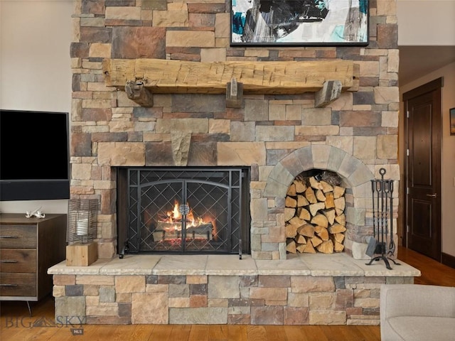 18 Upper Cascade Ridge Rd Unit 18, Big Sky, MT 59716 - detailed view of wood finished floors and a stone fireplace