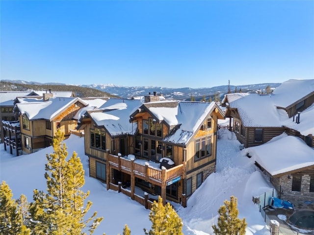 18 Upper Cascade Ridge Rd Unit 18, Big Sky, MT 59716 - snowy aerial view with a mountain view