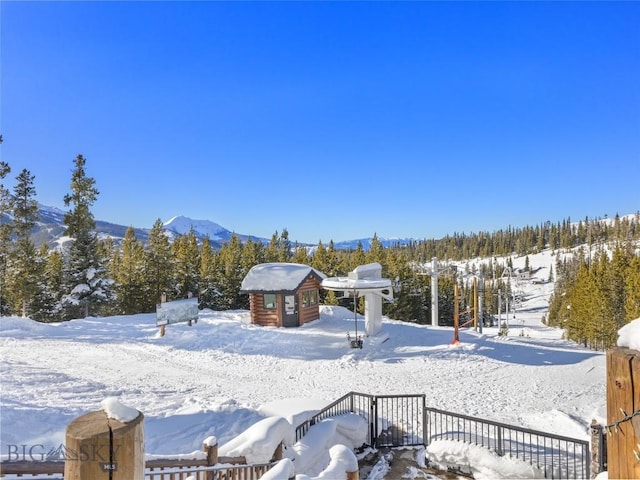 18 Upper Cascade Ridge Rd Unit 18, Big Sky, MT 59716 - snowy yard with a mountain view