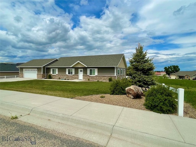 121 Ridge Ct, Dillon, MT 59725 - view of front facade with a garage, a front lawn, concrete driveway, and stone siding