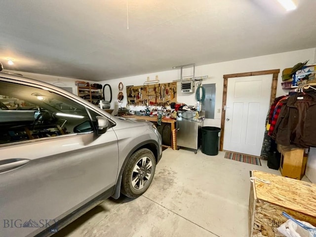 121 Ridge Ct, Dillon, MT 59725 - garage featuring electric panel and a heating unit