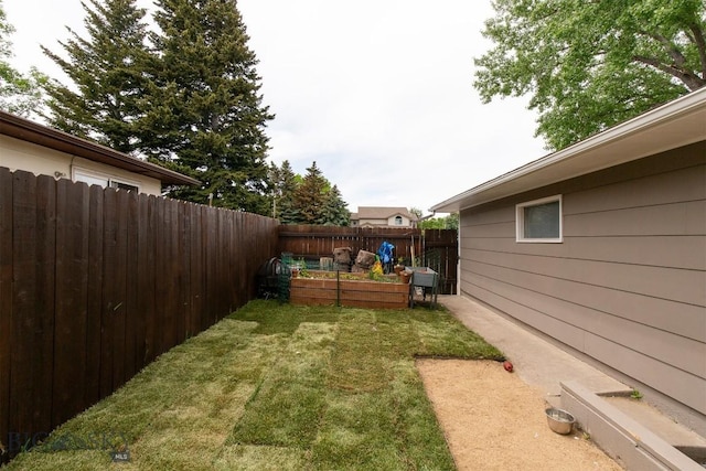 504 N 19th Ave, Bozeman, MT 59718 - view of yard featuring a vegetable garden