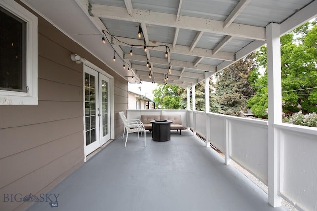 504 N 19th Ave, Bozeman, MT 59718 - view of patio featuring french doors and a fire pit