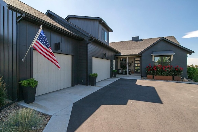 646 Arrow Trl, Bozeman, MT 59718 - view of front of home featuring driveway and a shingled roof