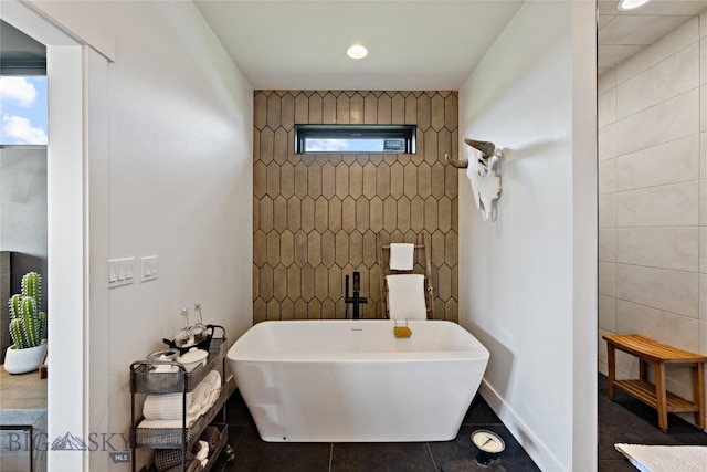 646 Arrow Trl, Bozeman, MT 59718 - full bath with a freestanding bath and tile patterned flooring