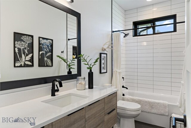 646 Arrow Trl, Bozeman, MT 59718 - full bathroom featuring vanity, toilet, and shower / bathtub combination with curtain