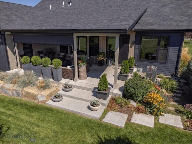 646 Arrow Trl, Bozeman, MT 59718 - back of property with a shingled roof, a patio, and a yard