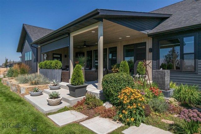 646 Arrow Trl, Bozeman, MT 59718 - rear view of property featuring a shingled roof, ceiling fan, and board and batten siding
