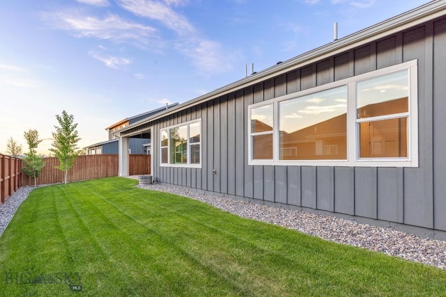 1609 Wyatt Earp Ct, Belgrade, MT 59714 - view of side of home with board and batten siding