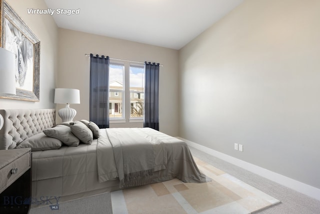 1609 Wyatt Earp Ct, Belgrade, MT 59714 - bedroom featuring baseboards and carpet