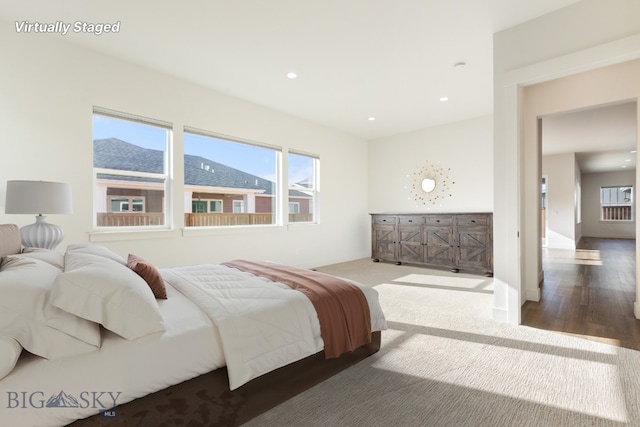 1609 Wyatt Earp Ct, Belgrade, MT 59714 - bedroom featuring recessed lighting and wood finished floors