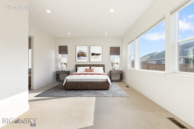 1609 Wyatt Earp Ct, Belgrade, MT 59714 - carpeted bedroom with recessed lighting and baseboards