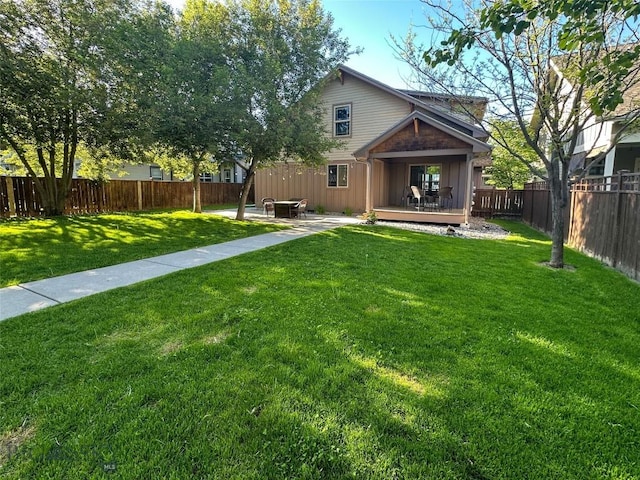 4442 Alexander, Bozeman, MT 59718 - rear view of house featuring a wooden deck, board and batten siding, and a patio