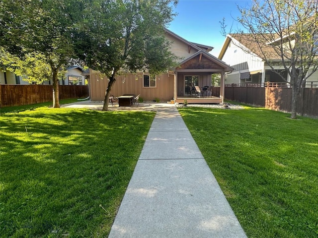 4442 Alexander, Bozeman, MT 59718 - back of property with a wooden deck and a patio