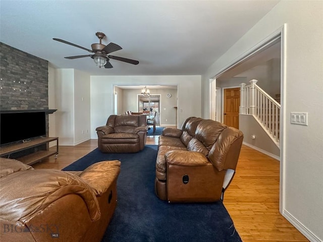 4442 Alexander, Bozeman, MT 59718 - living area with wood finished floors, a ceiling fan, and baseboards