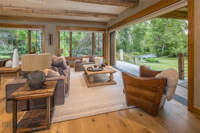 5933 Monforton School Rd, Bozeman, MT 59718 - living area with wood-type flooring and beamed ceiling