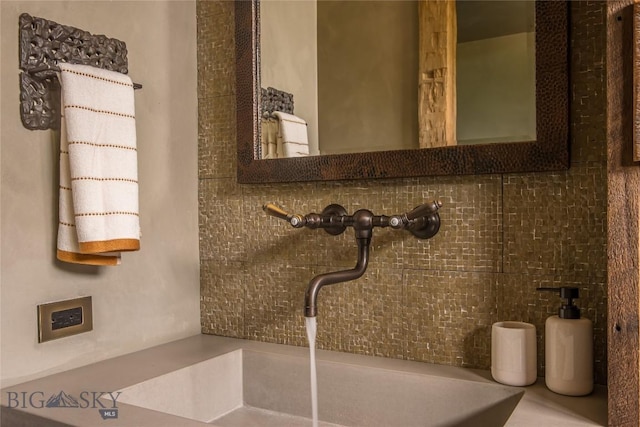 5933 Monforton School Rd, Bozeman, MT 59718 - bathroom with a sink and backsplash