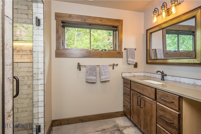 5933 Monforton School Rd, Bozeman, MT 59718 - bathroom featuring baseboards, healthy amount of natural light, vanity, and a shower stall
