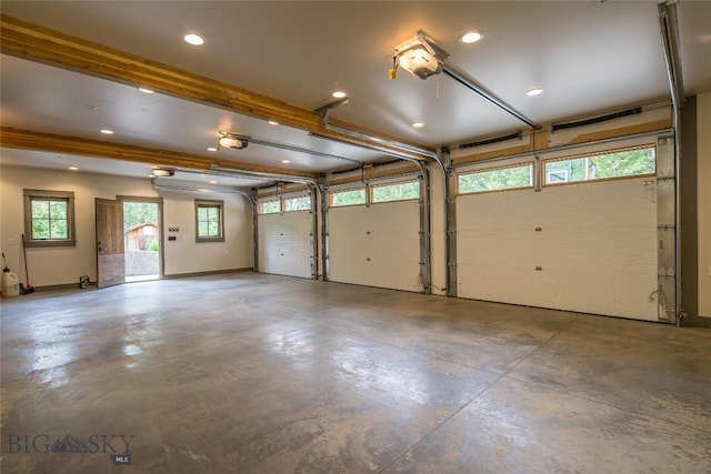 5933 Monforton School Rd, Bozeman, MT 59718 - garage with a garage door opener and recessed lighting