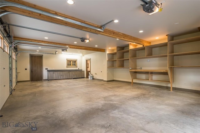 5933 Monforton School Rd, Bozeman, MT 59718 - garage with a garage door opener, baseboards, and recessed lighting