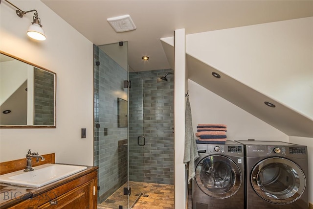 5933 Monforton School Rd, Bozeman, MT 59718 - full bath featuring a shower stall, vanity, separate washer and dryer, lofted ceiling, and recessed lighting